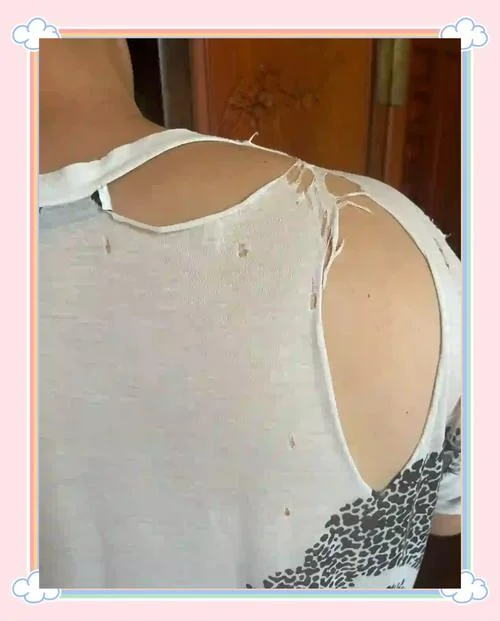 梦见衣服破了几个洞_1