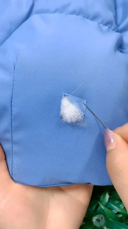 梦见羽绒服破了_2